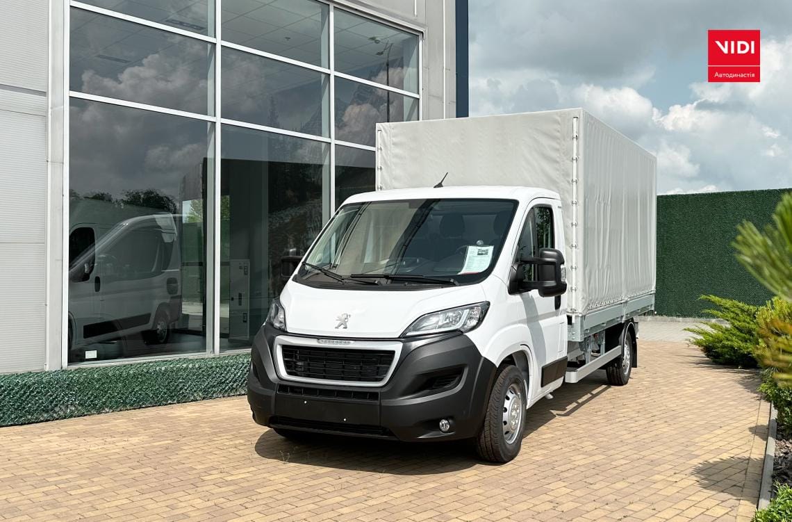 Бортовий Peugeot Boxer з тентом